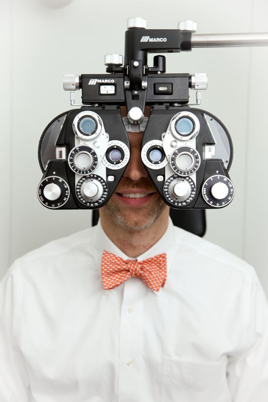 doctor-with-eye-exam-equipment